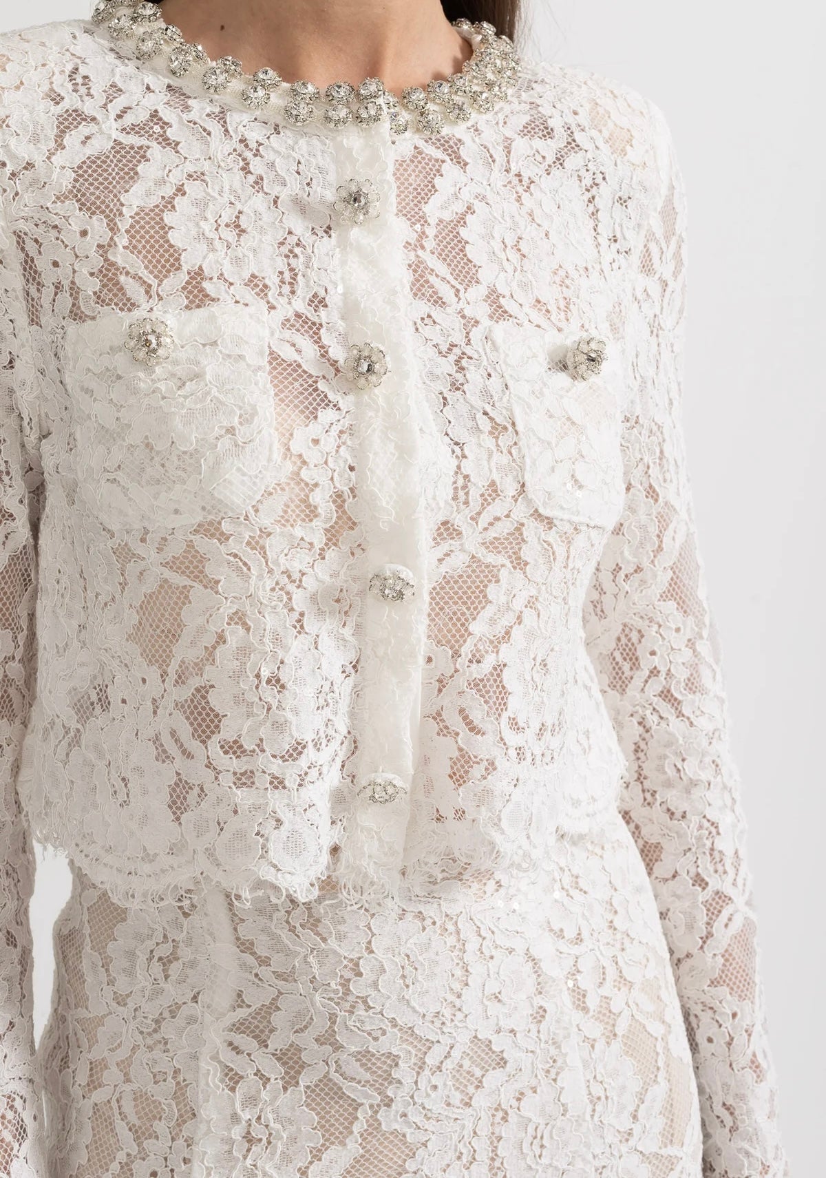 White lace co-ord set with sparkling neckline embellishments and midi skirt