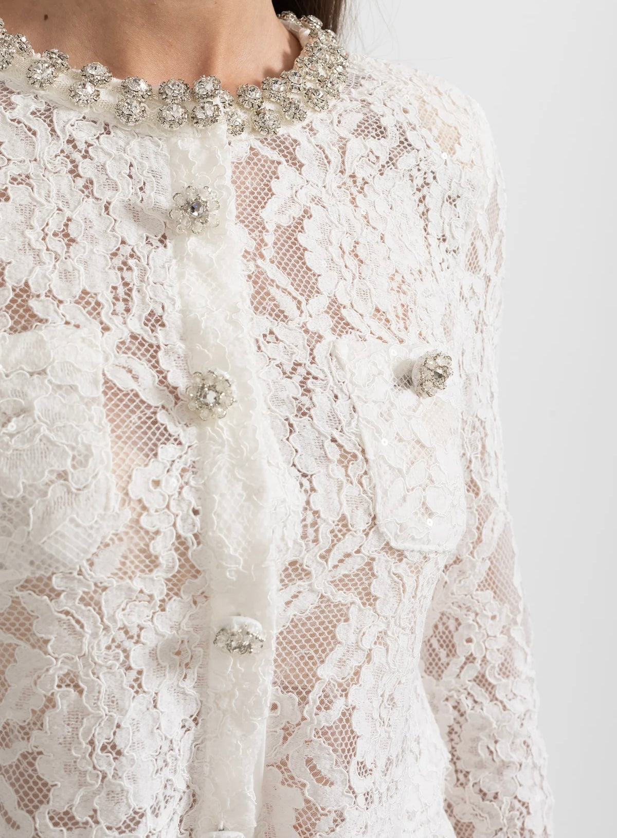 White lace co-ord set with sparkling neckline embellishments and midi skirt