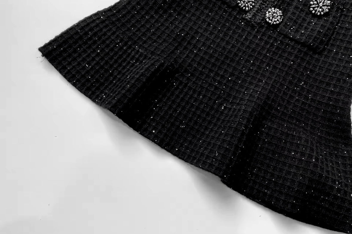 Black tweed mini dress with crystal buttons