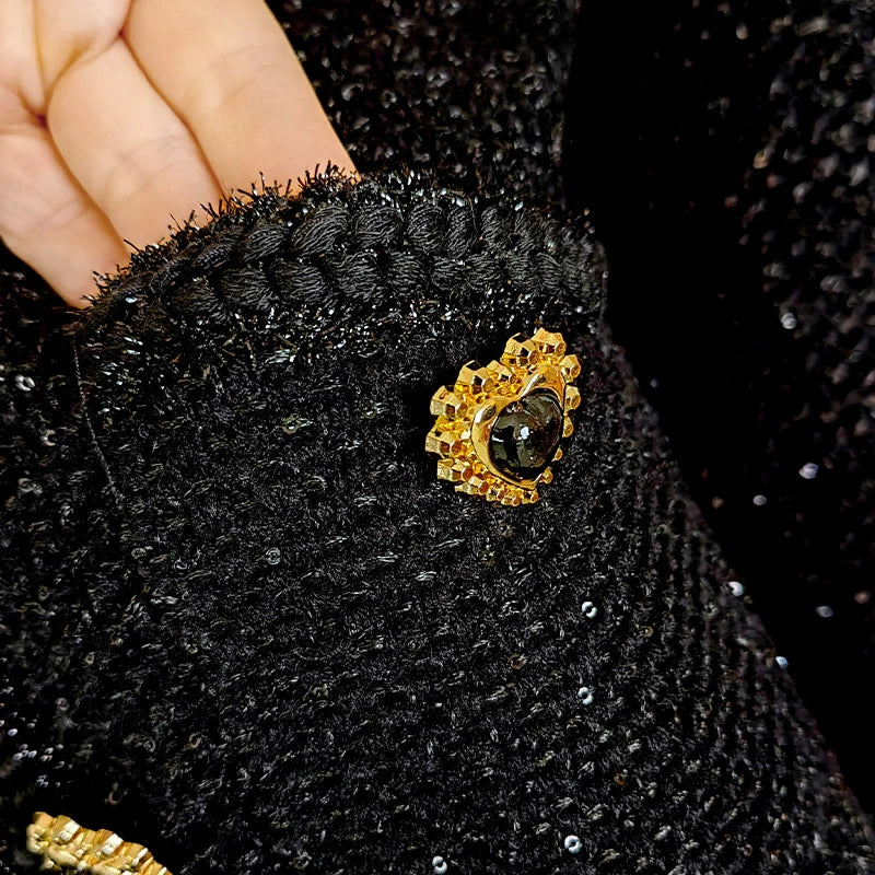 Black tweed mini dress with embellished buttons