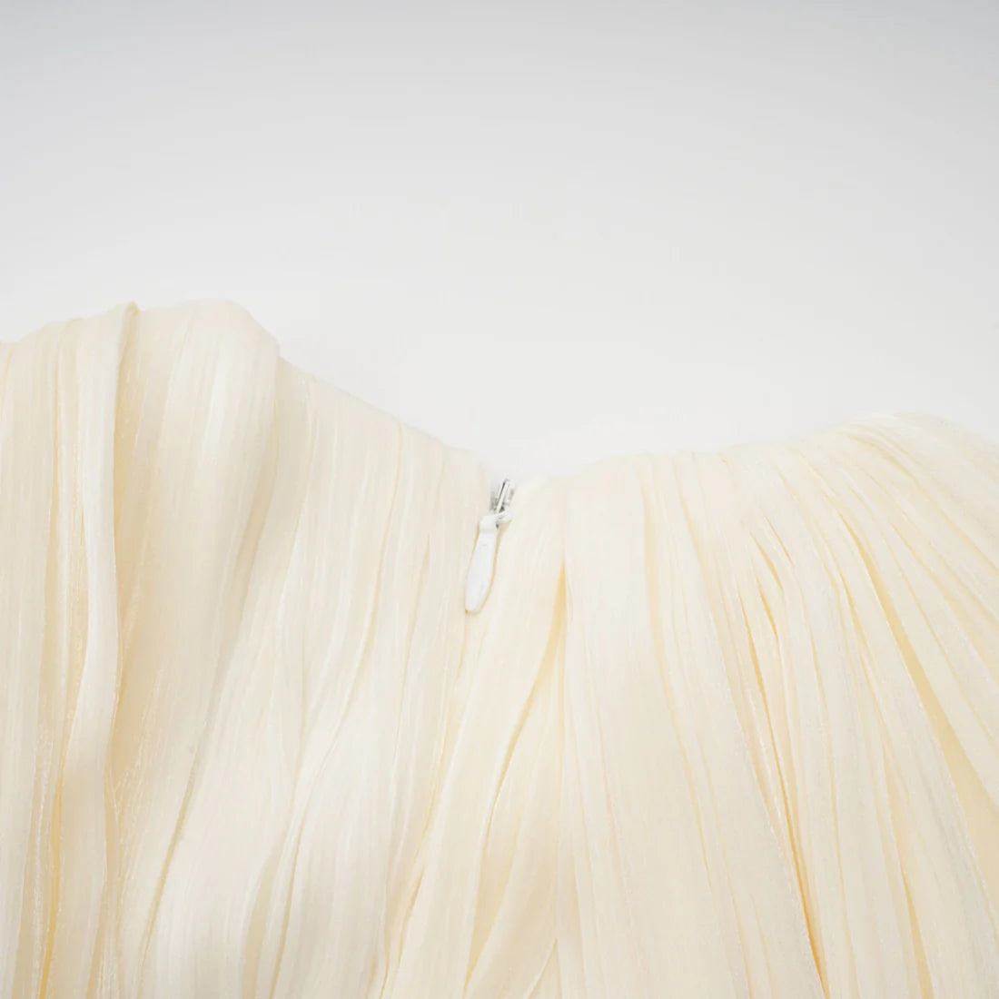 Ivory pleated goddess mini dress