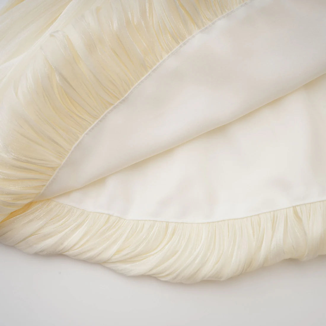 Ivory pleated goddess mini dress