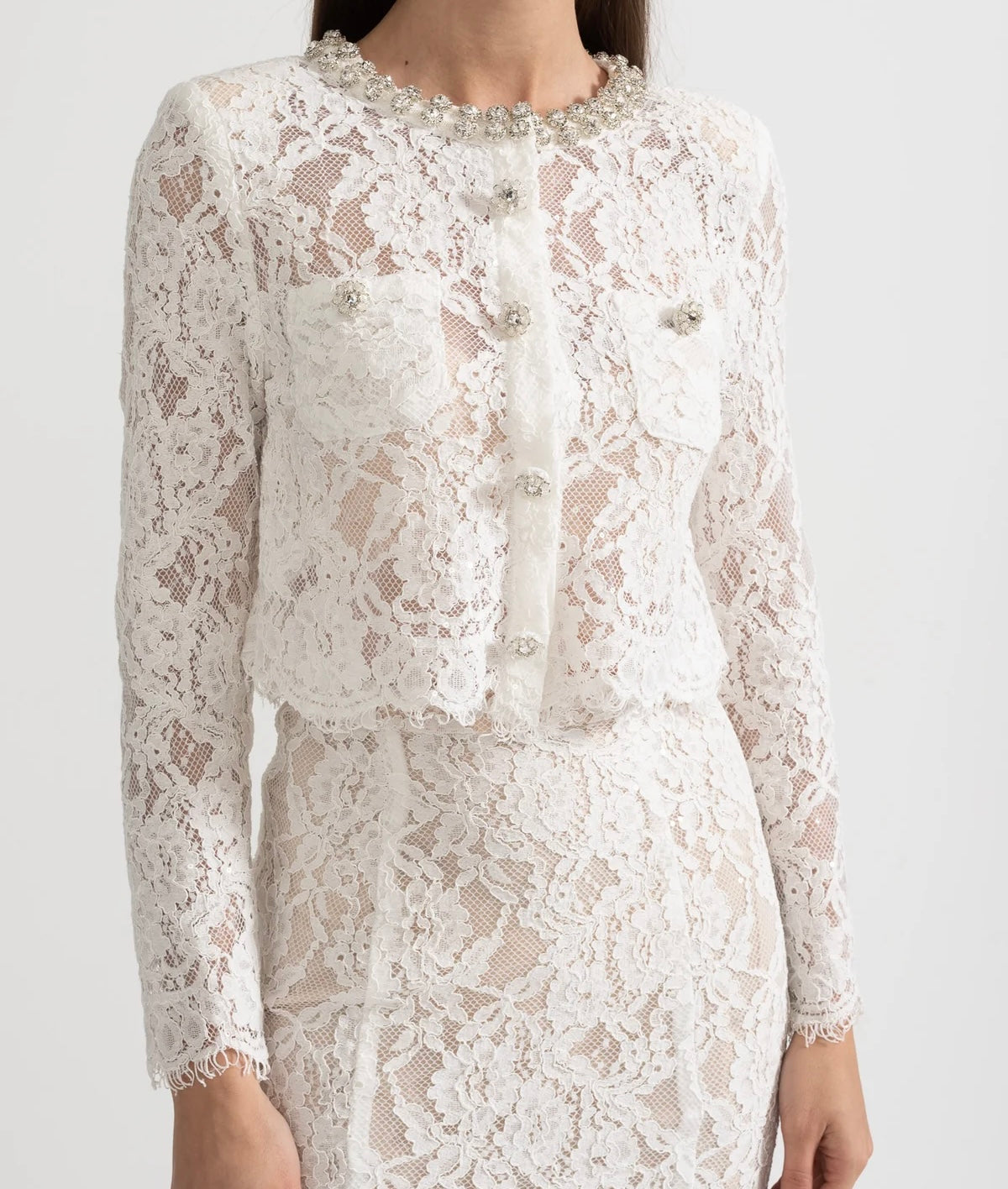 Blue lace co-ord set with sparkling neckline embellishments and midi skirt