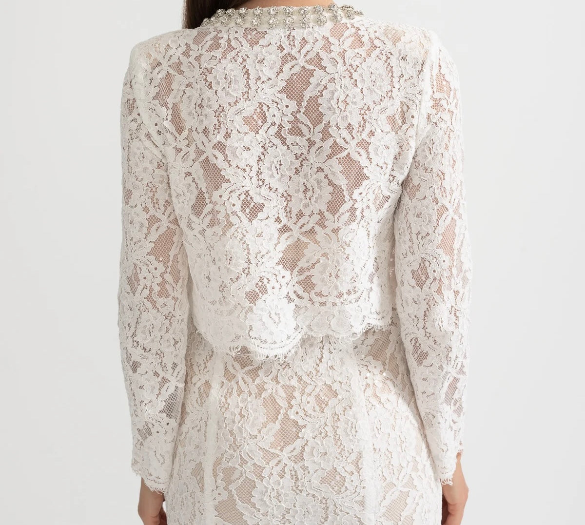Blue lace co-ord set with sparkling neckline embellishments and midi skirt