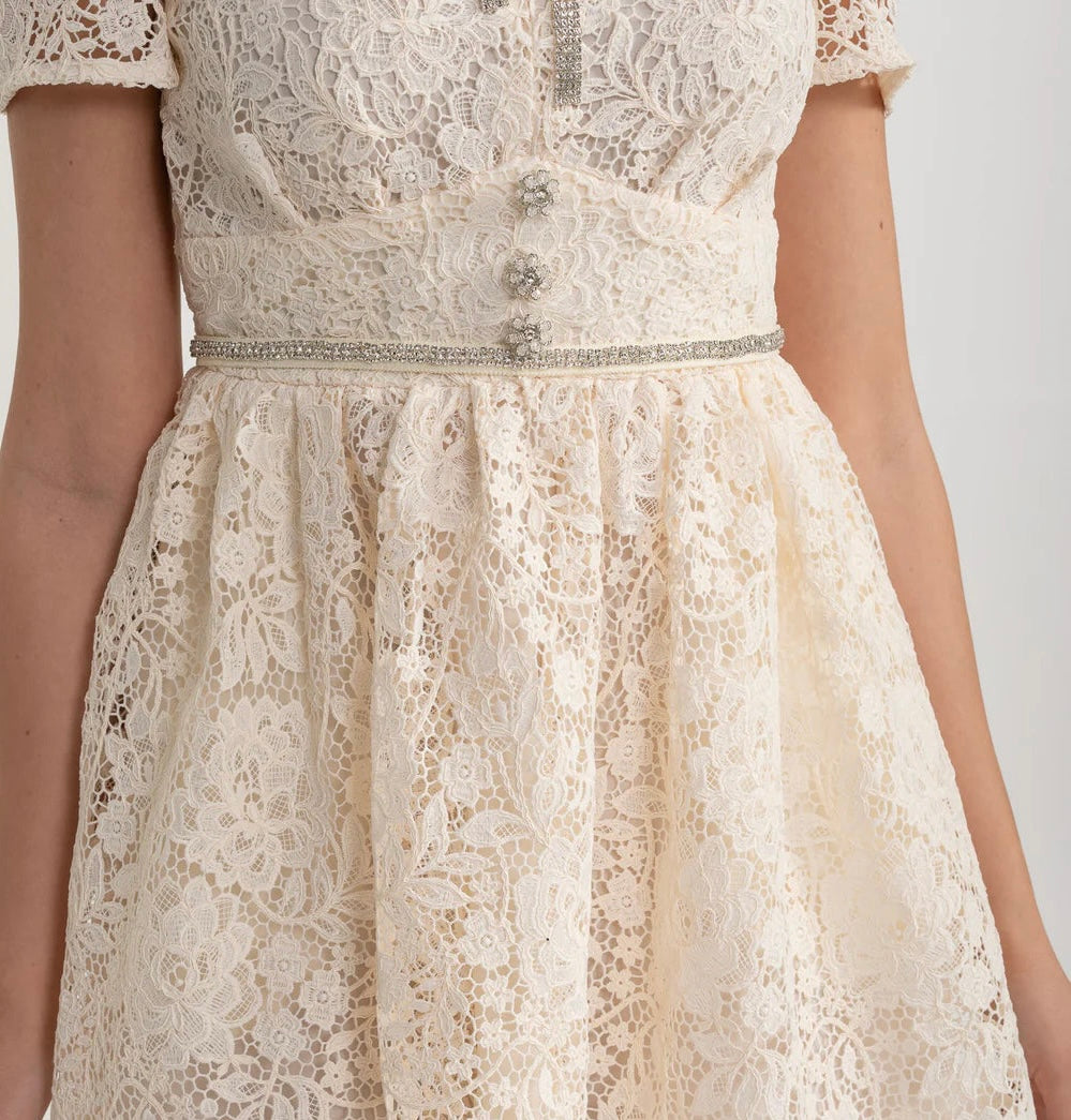 Ivoire Short Sleeved Lace Dress With Rounded Neckline And Decorative Bow
